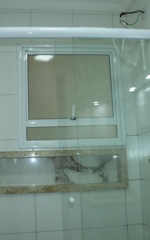 Casa de condomínio para alugar com 140m², 4 quartos e 3 vagasBanheiro da Suíte 2