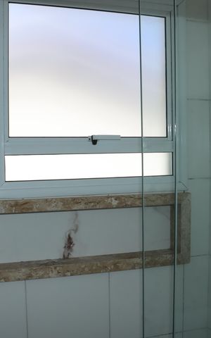Casa de condomínio para alugar com 140m², 4 quartos e 3 vagasBanheiro da Suíte 1 