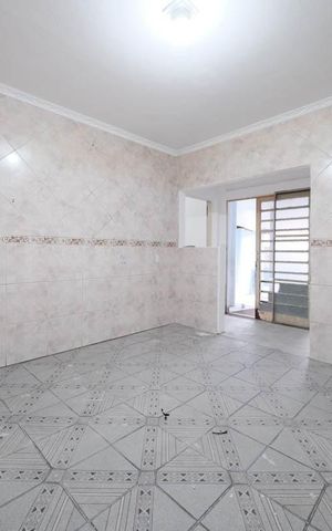 Casa à venda com 244m², 5 quartos e 4 vagasSala/Cozinha