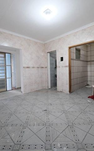 Casa à venda com 244m², 5 quartos e 4 vagasSala/Cozinha