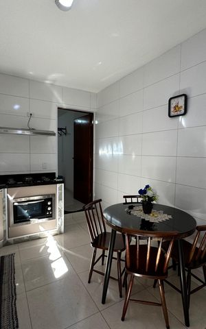 Casa à venda com 144m², 2 quartos e 2 vagas Casa à venda com 144m², 2 quartos e 2 vagasCozinha