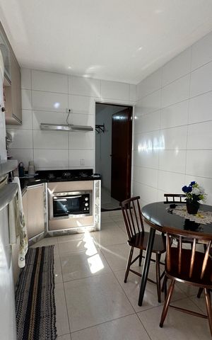 Casa à venda com 144m², 2 quartos e 2 vagas Casa à venda com 144m², 2 quartos e 2 vagasCozinha