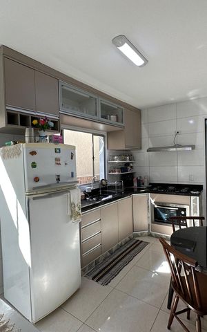 Casa à venda com 144m², 2 quartos e 2 vagas Casa à venda com 144m², 2 quartos e 2 vagasCozinha