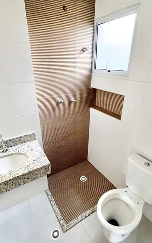 Casa de condomínio à venda com 124m², 3 quartos e 2 vagasBanheiro da Suíte 1