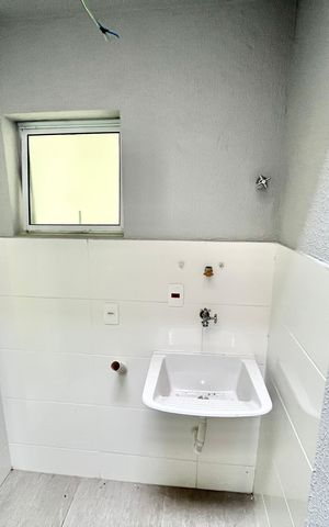 Casa de condomínio à venda com 124m², 3 quartos e 2 vagasLavanderia