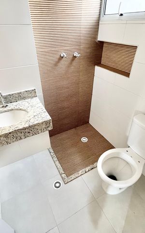 Casa de condomínio à venda com 124m², 3 quartos e 2 vagasBanheiro da Suíte 1