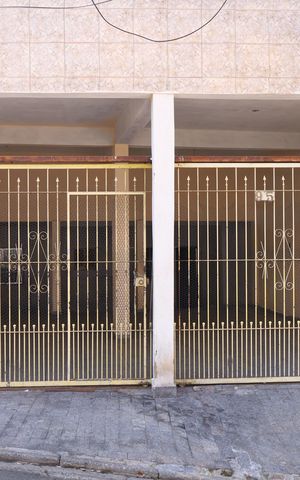 Casa à venda com 180m², 5 quartos e 2 vagasPlaca instalada no portão do imóvel - Código da placa: WYNY-1464