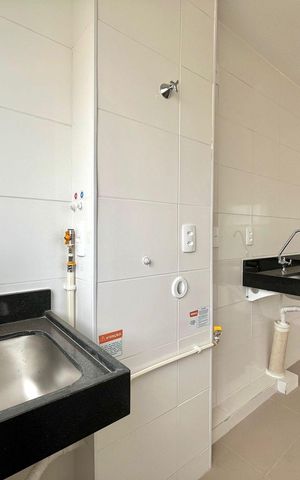 Apartamento à venda com 48m², 2 quartos e 1 vaga Apartamento à venda com 48m², 2 quartos e 1 vagaCozinha e Área de Serviço