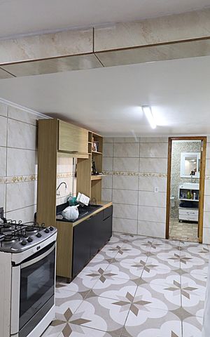 Casa à venda com 90m², 2 quartos e 2 vagasCozinha