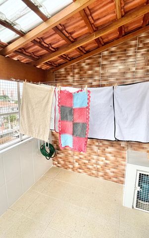 Casa à venda com 72m², 2 quartos e 1 vaga Casa à venda com 72m², 2 quartos e 1 vagaVaranda