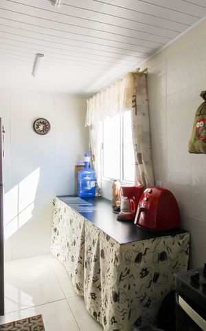 Casa à venda com 100m², 4 quartos e 2 vagas Casa à venda com 100m², 4 quartos e 2 vagasCozinha
