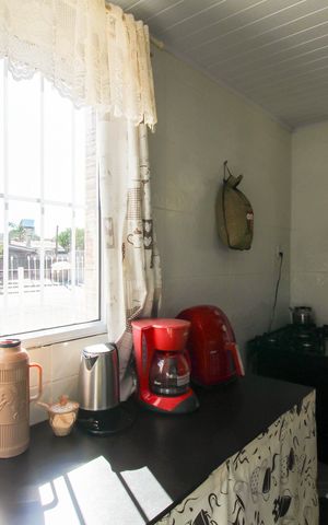Casa à venda com 100m², 4 quartos e 2 vagas Casa à venda com 100m², 4 quartos e 2 vagasCozinha