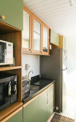 Casa à venda com 100m², 4 quartos e 2 vagas Casa à venda com 100m², 4 quartos e 2 vagasCozinha