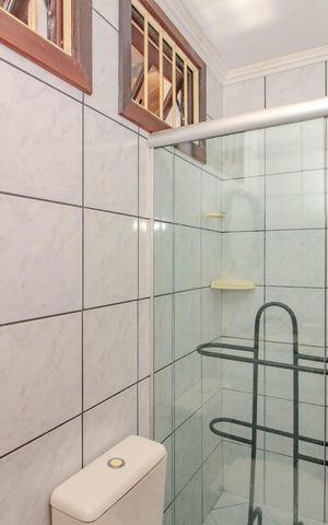 Casa à venda com 192m², 3 quartos e 2 vagas Casa à venda com 192m², 3 quartos e 2 vagasBanheiro Social 2