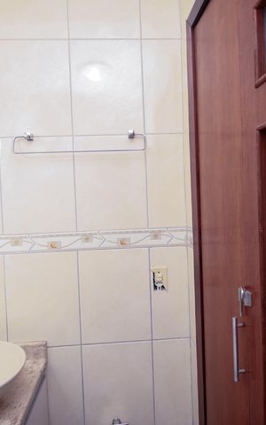 Casa à venda com 72m², 2 quartos e 1 vaga Casa à venda com 72m², 2 quartos e 1 vagaBanheiro da Suíte 1