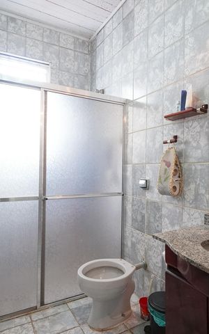 Casa à venda com 152m², 3 quartos e 1 vagaBanheiro