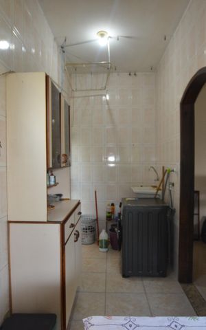 Casa à venda com 350m², 5 quartos e 8 vagasCozinha/ Área de Serviço