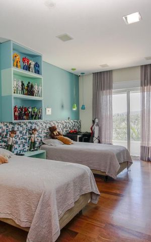 Casa de condomínio à venda com 439m², 4 quartos e 2 vagas Casa de condomínio à venda com 439m², 4 quartos e 2 vagasQuarto