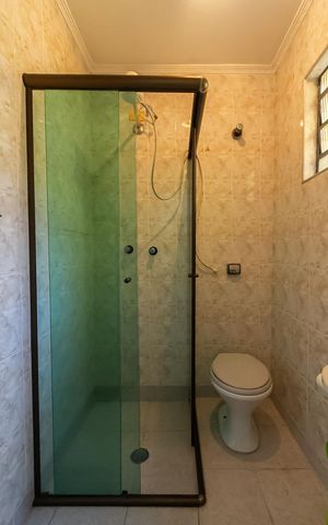Casa à venda com 187m², 4 quartos e 2 vagas Casa à venda com 187m², 4 quartos e 2 vagasBanheiro da Suíte 2