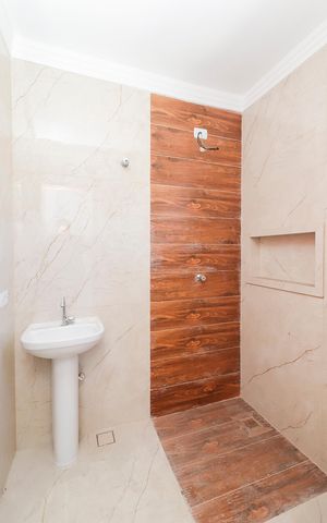 Casa à venda com 116m², 3 quartos e 2 vagasBanheiro da Suíte
