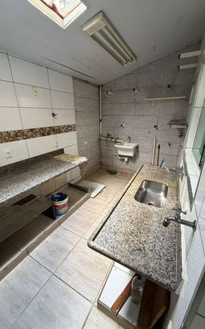 Casa à venda com 100m², 2 quartos e 2 vagas Casa à venda com 100m², 2 quartos e 2 vagasCozinha