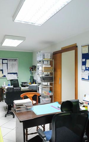 Casa para alugar com 396m², 4 quartos e 6 vagasEscritório 1