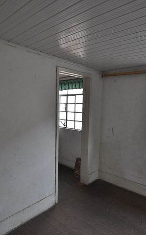 Casa à venda com 66m², 2 quartos e 2 vagasSala de TV