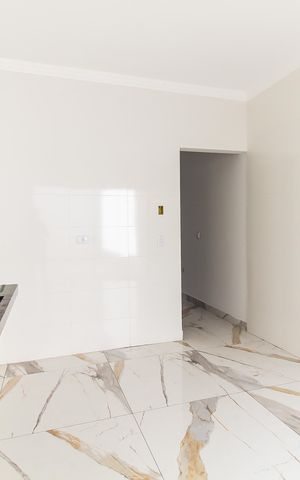 Casa à venda com 116m², 3 quartos e 2 vagas Casa à venda com 116m², 3 quartos e 2 vagasCozinha