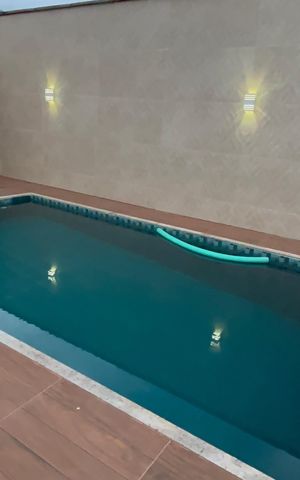 Casa de condomínio à venda com 360m², 4 quartos e 4 vagas Casa de condomínio à venda com 360m², 4 quartos e 4 vagasÁrea externa