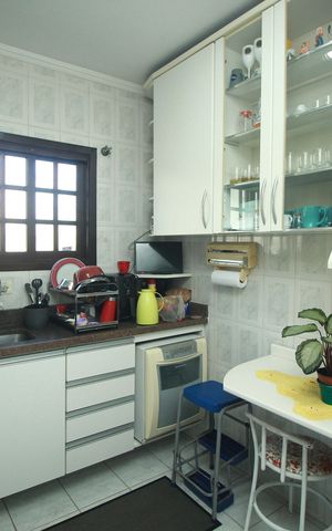 Casa à venda com 120m², 3 quartos e 3 vagas Casa à venda com 120m², 3 quartos e 3 vagasCozinha