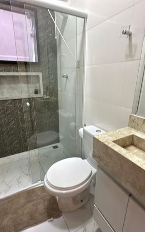 Casa de condomínio à venda com 118m², 2 quartos e 2 vagas Casa de condomínio à venda com 118m², 2 quartos e 2 vagasBanheiro da Suíte 1