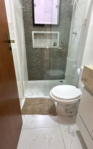 Casa de condomínio à venda com 118m², 2 quartos e 2 vagas Casa de condomínio à venda com 118m², 2 quartos e 2 vagasBanheiro da Suíte 1