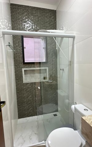 Casa de condomínio à venda com 118m², 2 quartos e 2 vagas Casa de condomínio à venda com 118m², 2 quartos e 2 vagasBanheiro da Suíte 1