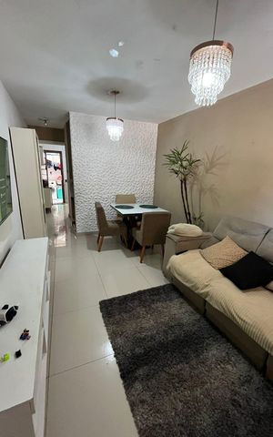Casa de condomínio à venda com 67m², 2 quartos e 1 vagaSala