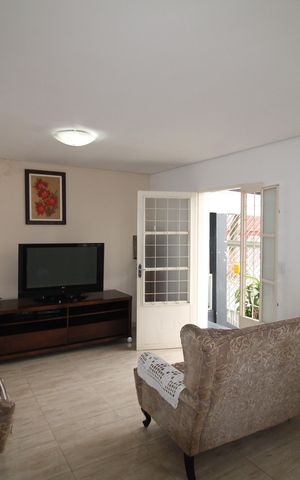 Casa à venda com 259m², 5 quartos e 3 vagasSala
