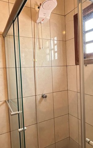 Casa à venda com 150m², 3 quartos e 3 vagas Casa à venda com 150m², 3 quartos e 3 vagasBanheiro 2
