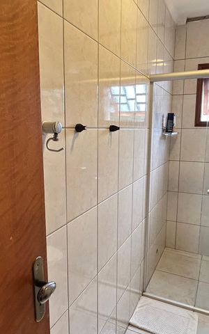 Casa à venda com 150m², 3 quartos e 3 vagas Casa à venda com 150m², 3 quartos e 3 vagasBanheiro 1