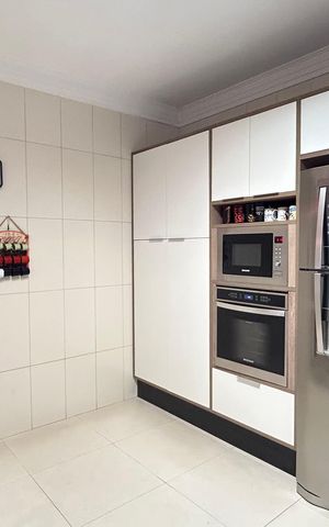 Casa à venda com 150m², 3 quartos e 3 vagas Casa à venda com 150m², 3 quartos e 3 vagasCozinha