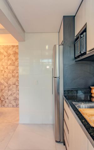 Apartamento à venda com 49m², 2 quartos e 1 vaga Apartamento à venda com 49m², 2 quartos e 1 vagaCozinha e Área de Serviço