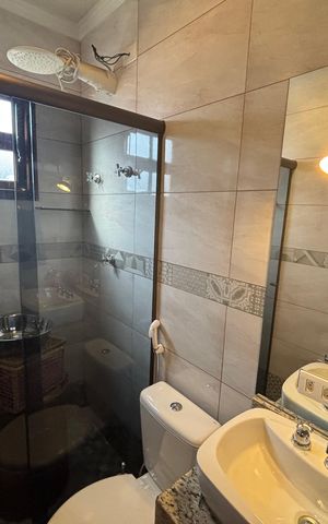 Casa à venda com 200m², 3 quartos e 4 vagas Casa à venda com 200m², 3 quartos e 4 vagasBanheiro da Suíte 1