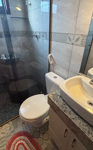 Casa à venda com 200m², 3 quartos e 4 vagas Casa à venda com 200m², 3 quartos e 4 vagasBanheiro da Suíte 1
