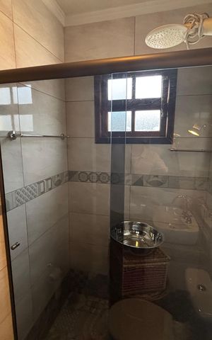 Casa à venda com 200m², 3 quartos e 4 vagas Casa à venda com 200m², 3 quartos e 4 vagasBanheiro da Suíte 1