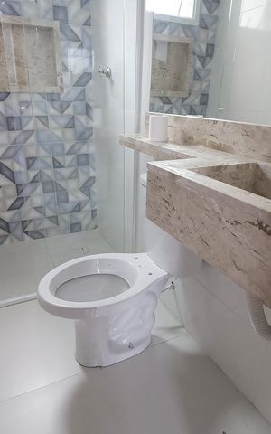 Apartamento à venda com 58m², 2 quartos e 1 vaga Apartamento à venda com 58m², 2 quartos e 1 vagaBanheiro Suíte