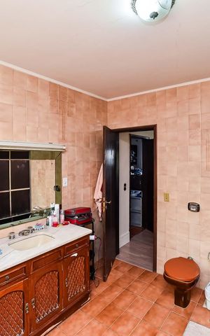 Casa à venda com 240m², 3 quartos e 2 vagas Casa à venda com 240m², 3 quartos e 2 vagasBanheiro da Suíte 2