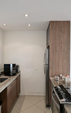 Casa de condomínio à venda com 89m², 2 quartos e 2 vagasCozinha