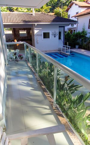 Casa de condomínio à venda com 582m², 4 quartos e 5 vagas