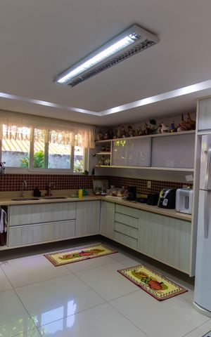 Casa de condomínio à venda com 582m², 4 quartos e 5 vagas