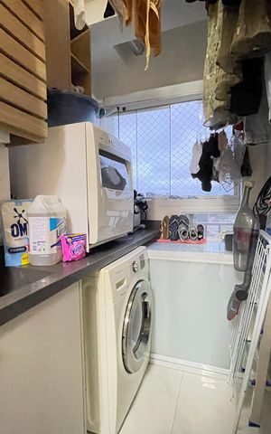 Apartamento à venda com 66m², 2 quartos e 1 vaga Apartamento à venda com 66m², 2 quartos e 1 vagaCozinha e Área de Serviço