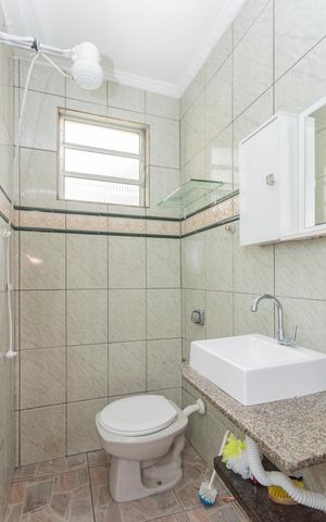 Casa à venda com 200m², 4 quartos e 2 vagasBanheiro da Varanda