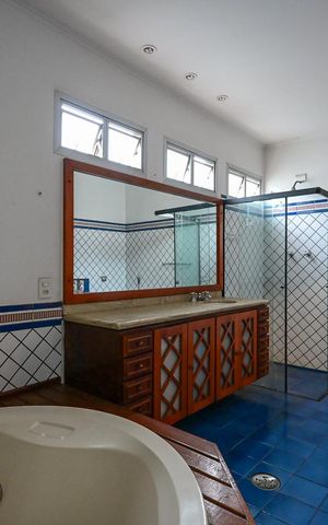 Casa à venda com 850m², 4 quartos e 9 vagasBanheiro Suíte 1